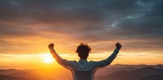 10 Quotes About Overcoming Adversity That Hit Deep Triumphant figure on mountain peak at sunris