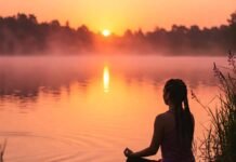 Mindfulness for Beginners: A Simple Guide to Get Started Tranquil sunrise lake meditation.