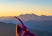 How to Create a Daily Stress Management Routine person practices yoga on a hill at sunrise