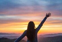 Positive Thinking for Beginners: A Step-by-Step Guide Sunrise freedom on a hill.